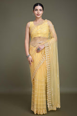 Glamorous Yellow Sequin Work Soft Net Saree With Unstitched Blouse Piece