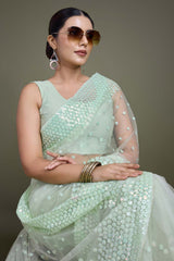 Light Green Soft Net Saree with Sequin Embellished Border and Pallu