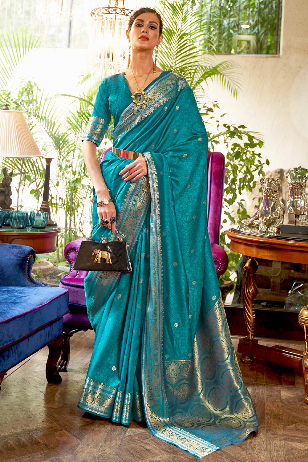 Kallavi Teal Silk Woven Saree