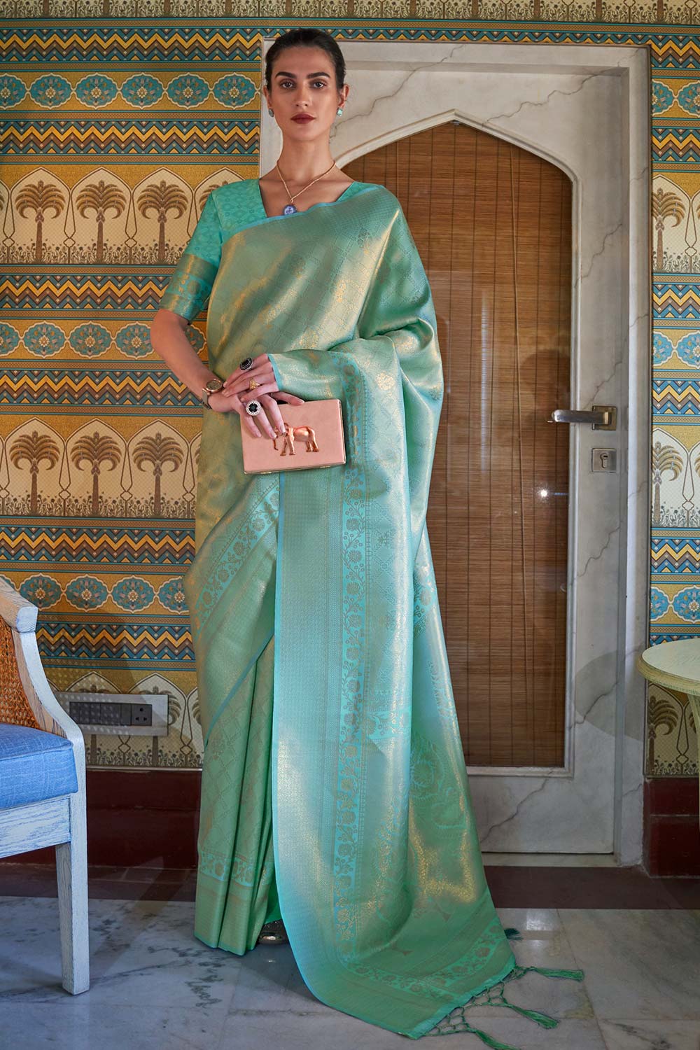 Kumbhi Teal Silk Woven Saree