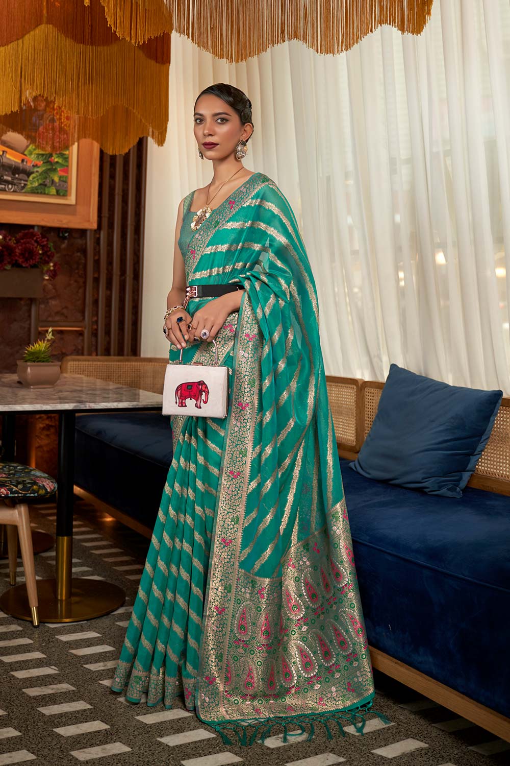 Kahana Teal Organza Woven Saree