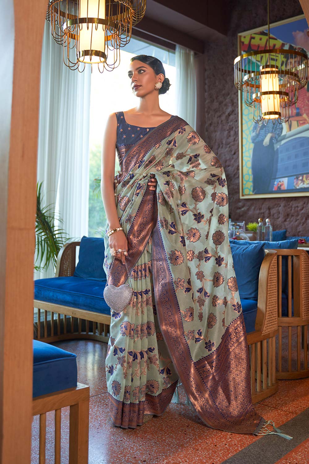 Kadvika Sea Green Organza Woven Saree