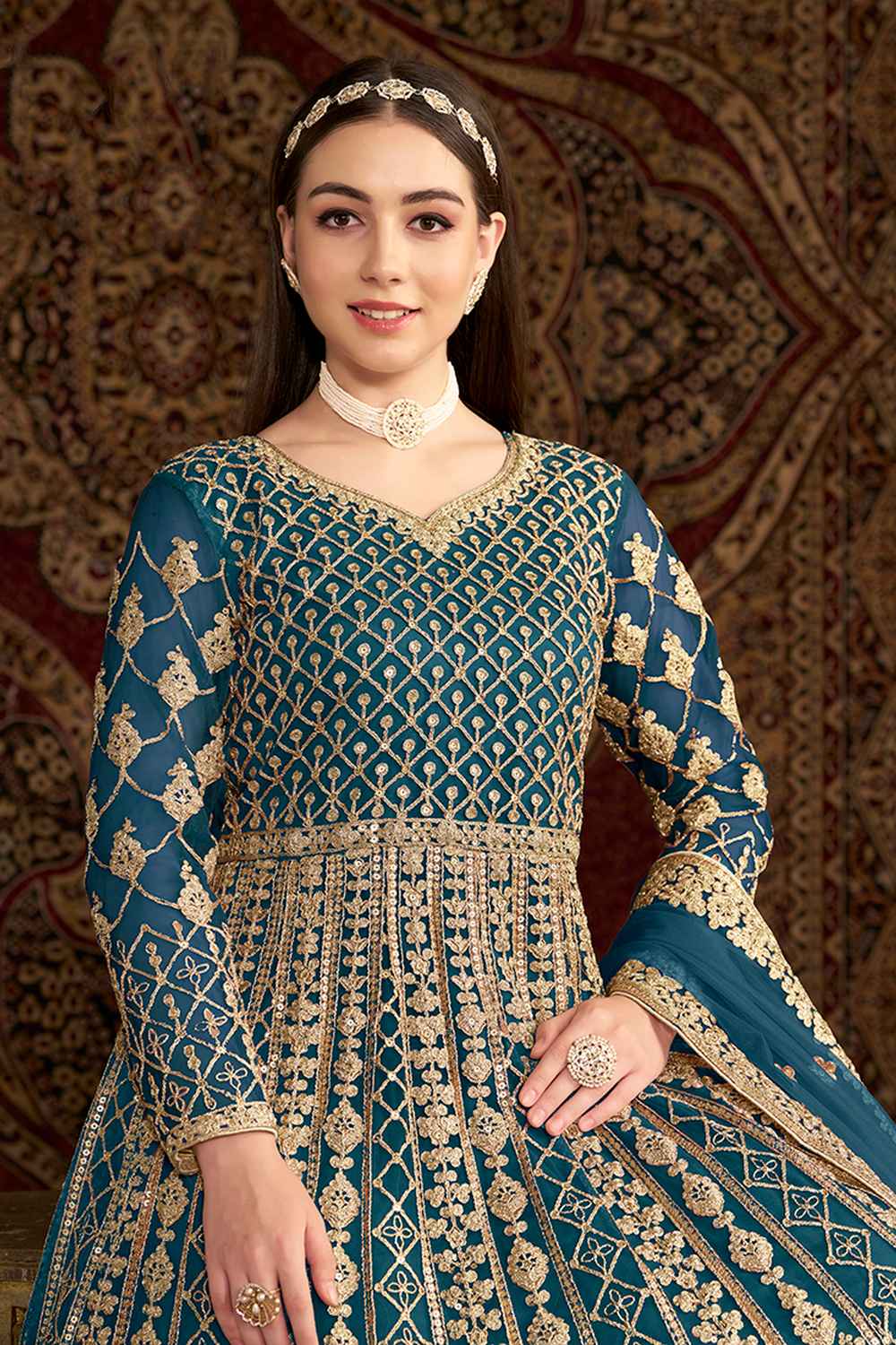 Turquoise Embroidered Net Salwar Kameez