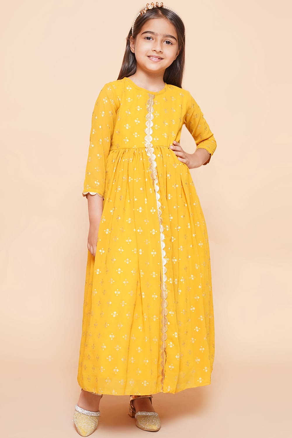 Mustard Georgette Printed Flared Round Neck Dresses