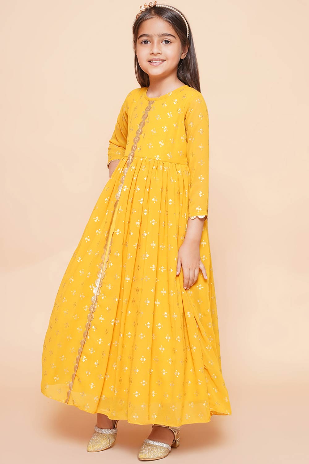 Mustard Georgette Printed Flared Round Neck Dresses