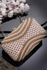 Adorn Baby Pink And Gold Embellished Faux Silk Clutch