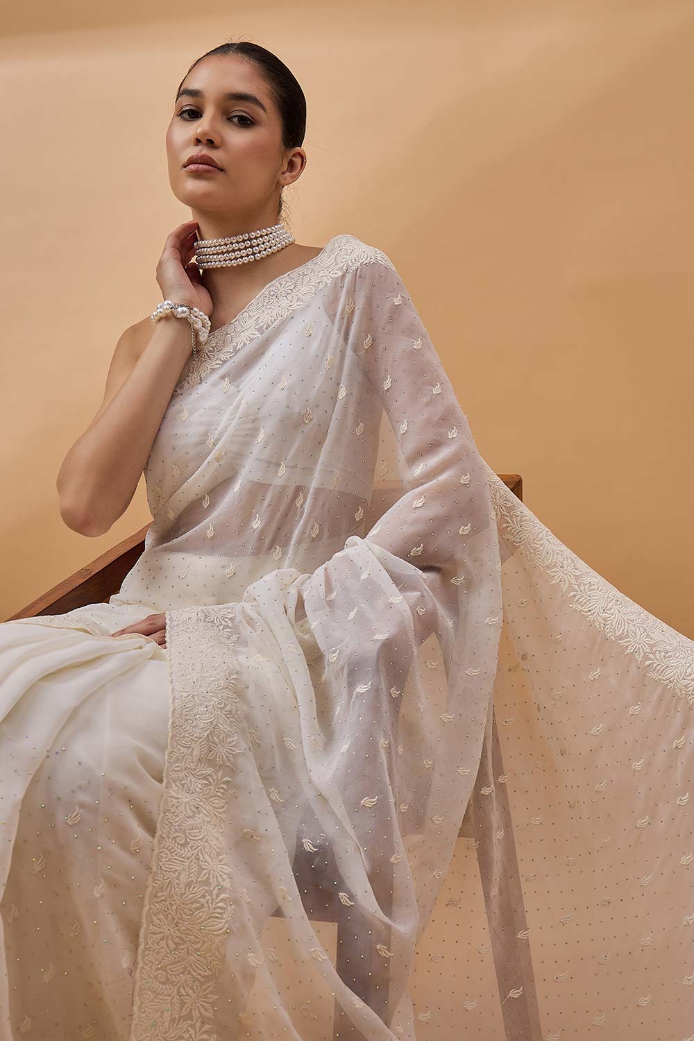 Cream Pure Georgette Woven Saree