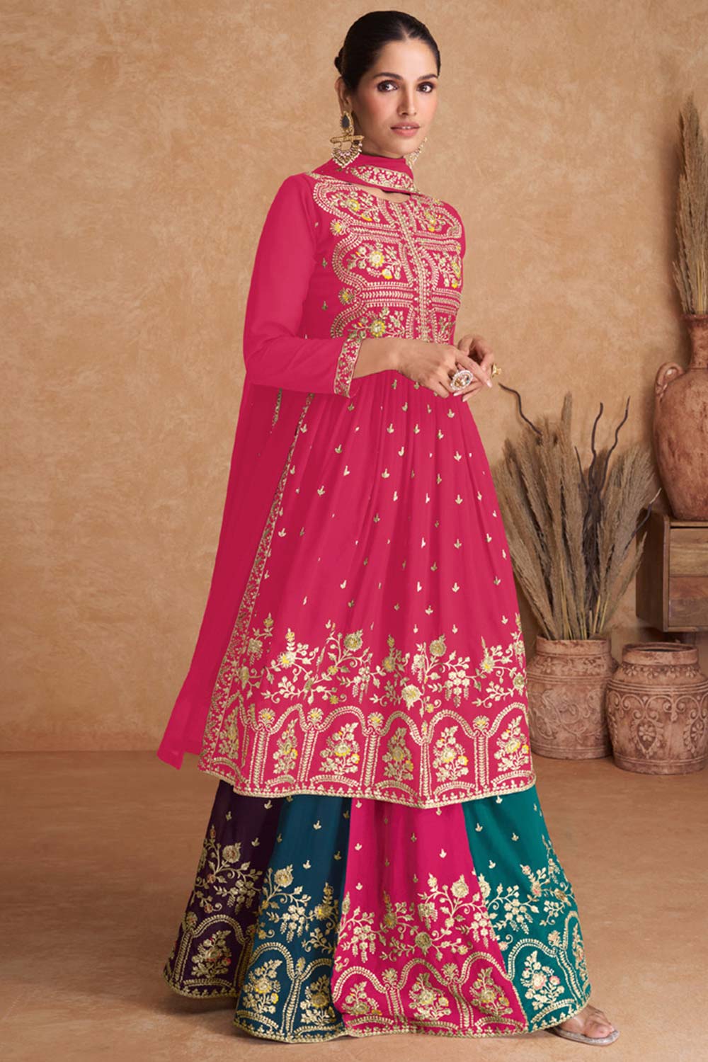 Rani Pink Georgette Embroidered Salwar Suit