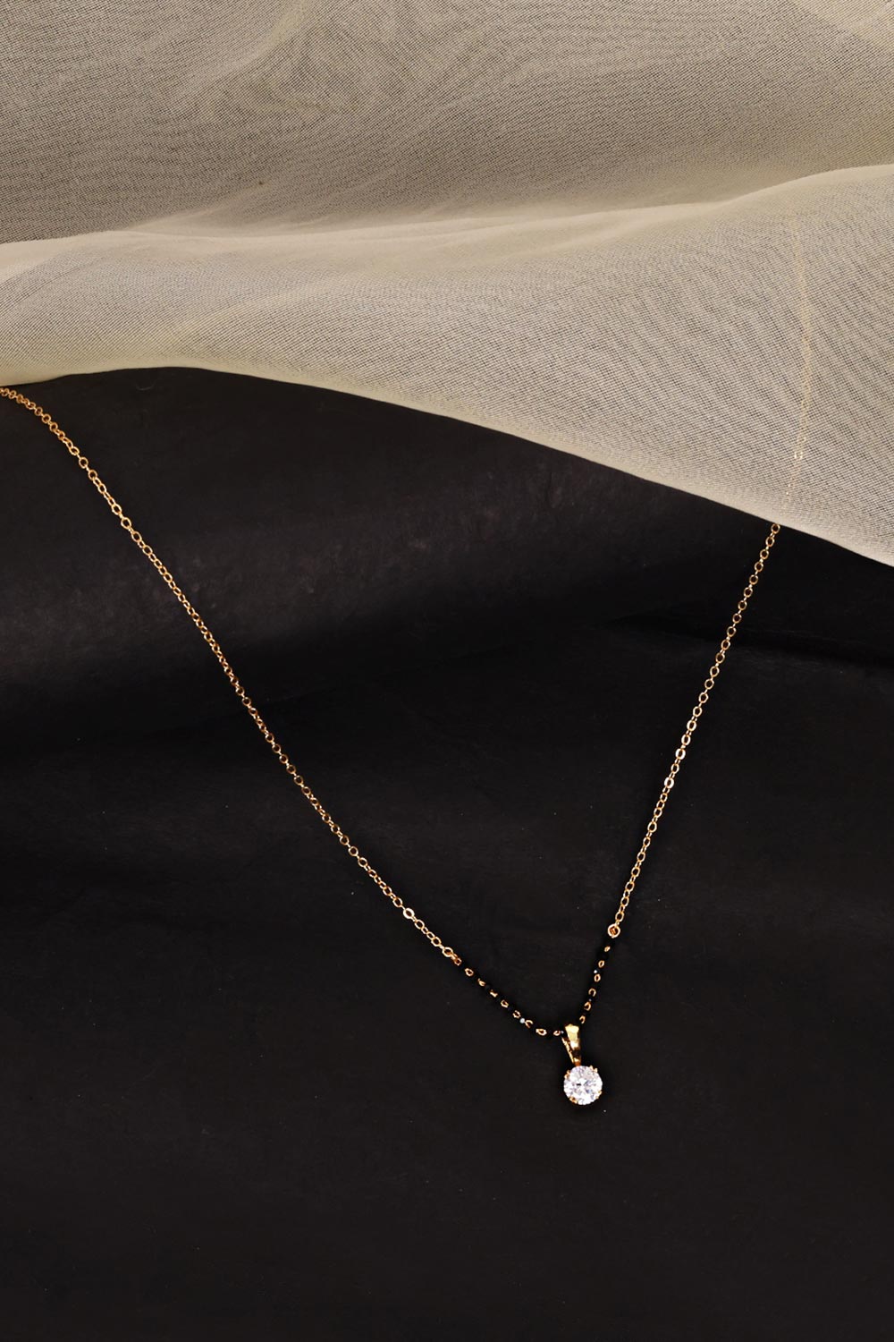 Gold Plated American Diamond And Black Beaded Mangalsutra