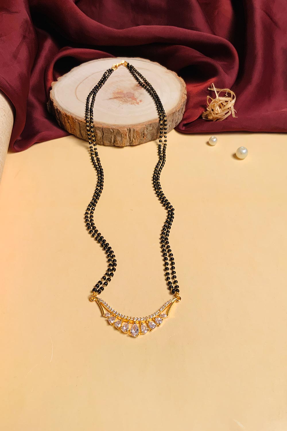 Gold Plated American Diamond And Black Beaded Mangalsutra