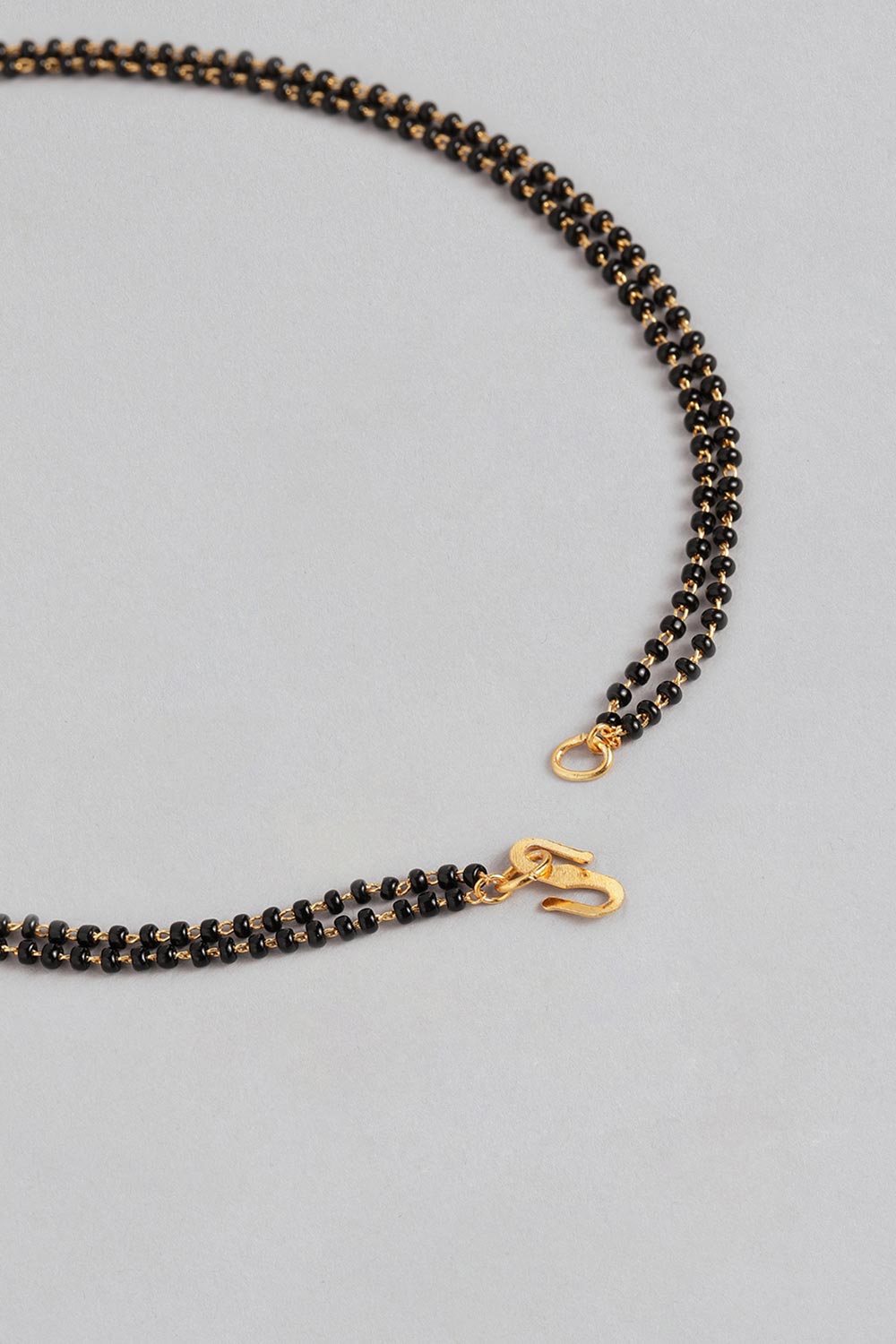 Gold Plated American Diamond And Black Beaded Mangalsutra