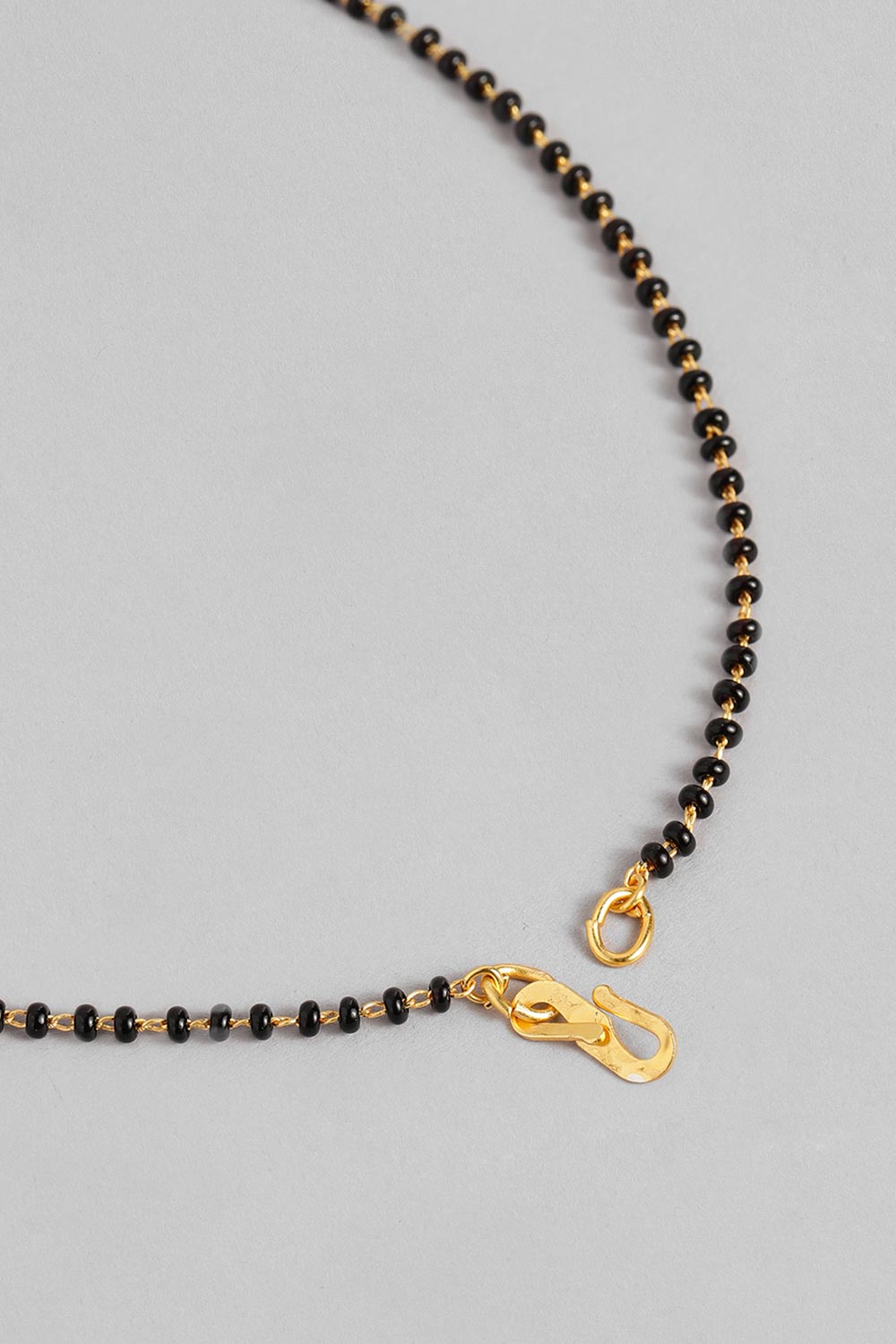 Gold Plated American Diamond And Black Beaded Mangalsutra