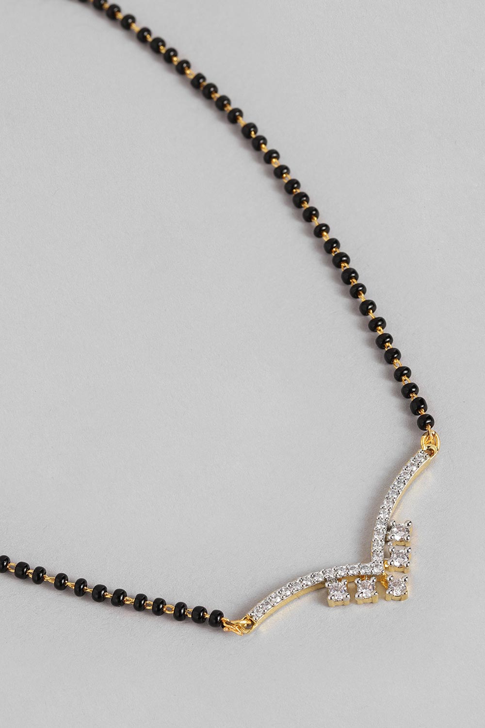 Gold Plated American Diamond And Black Beaded Mangalsutra