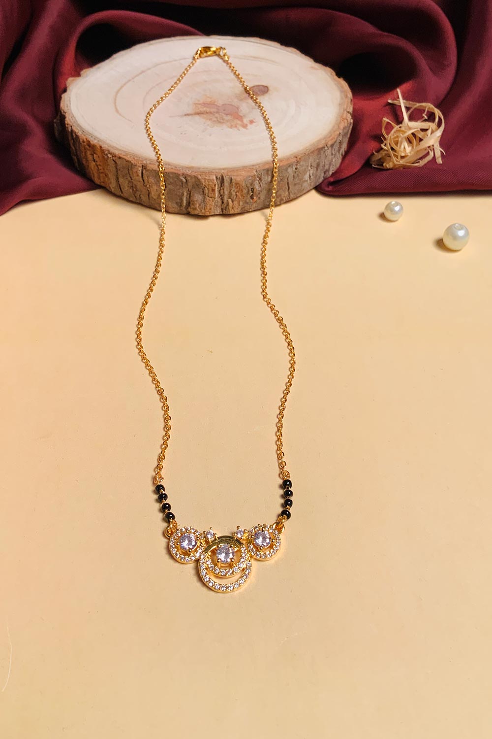 Gold Plated American Diamond And Black Beaded Mangalsutra