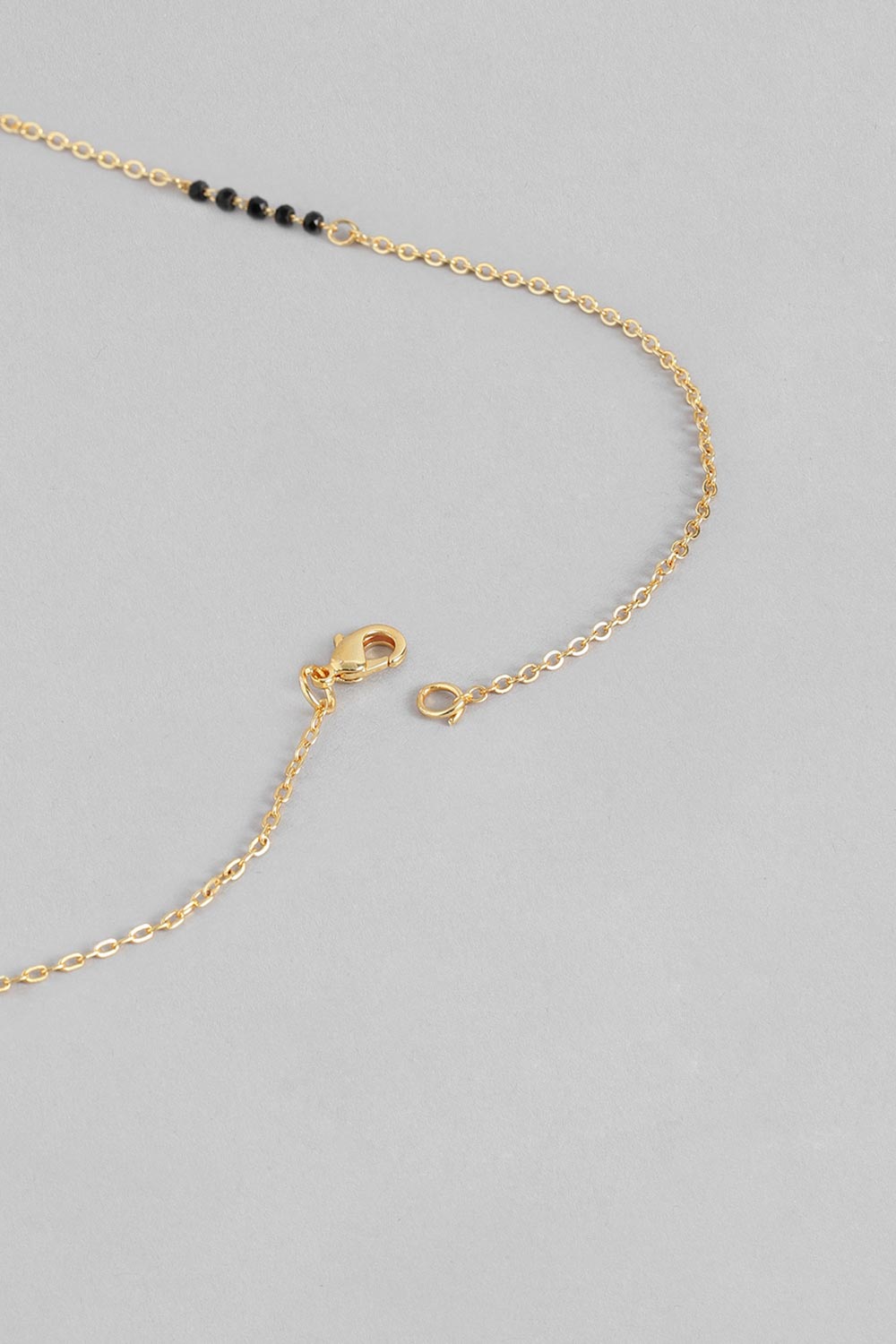 Gold Plated American Diamond And Black Beaded Mangalsutra