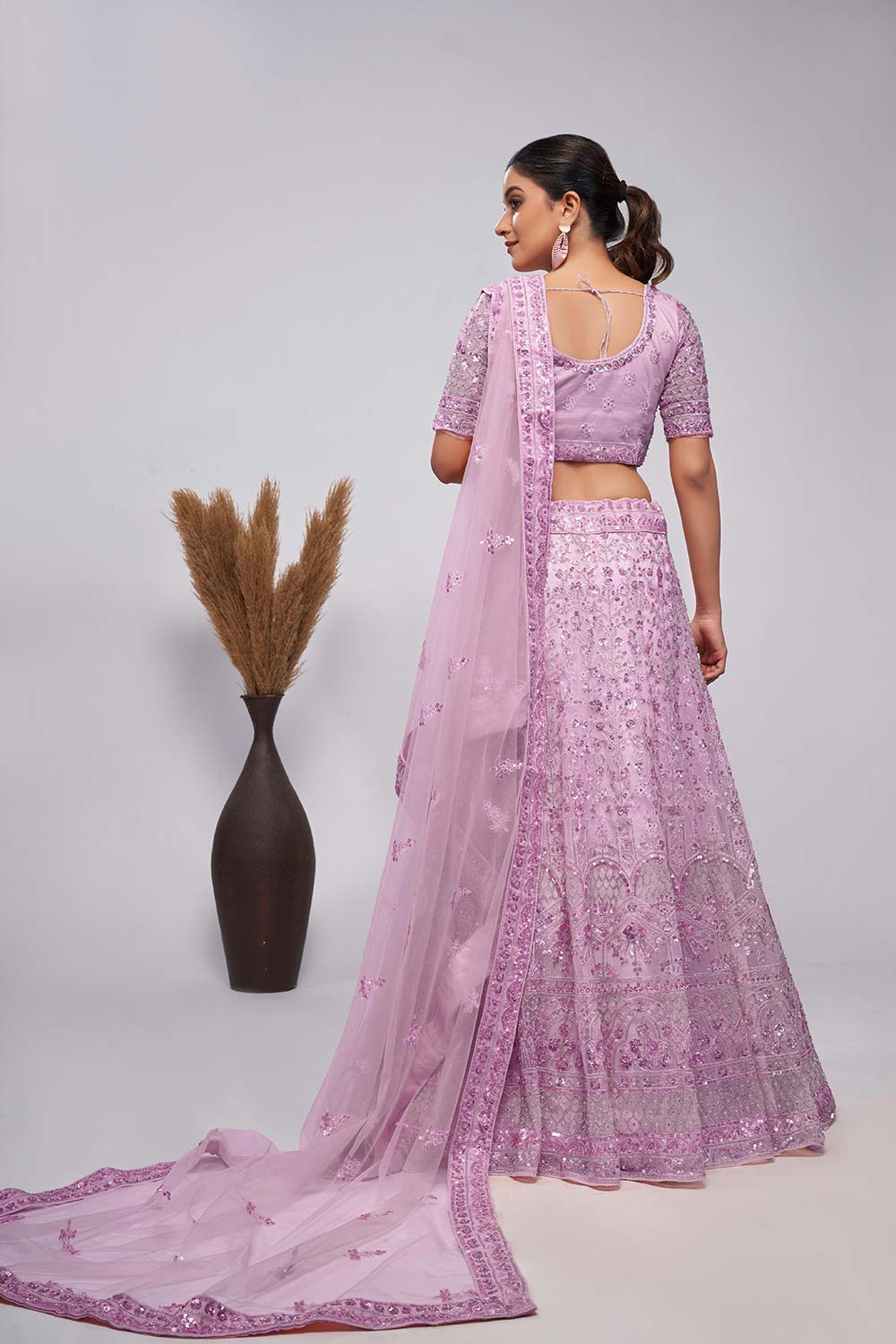 Mauve Soft Net Pearl, Sequins And Embellishments Lehenga Set