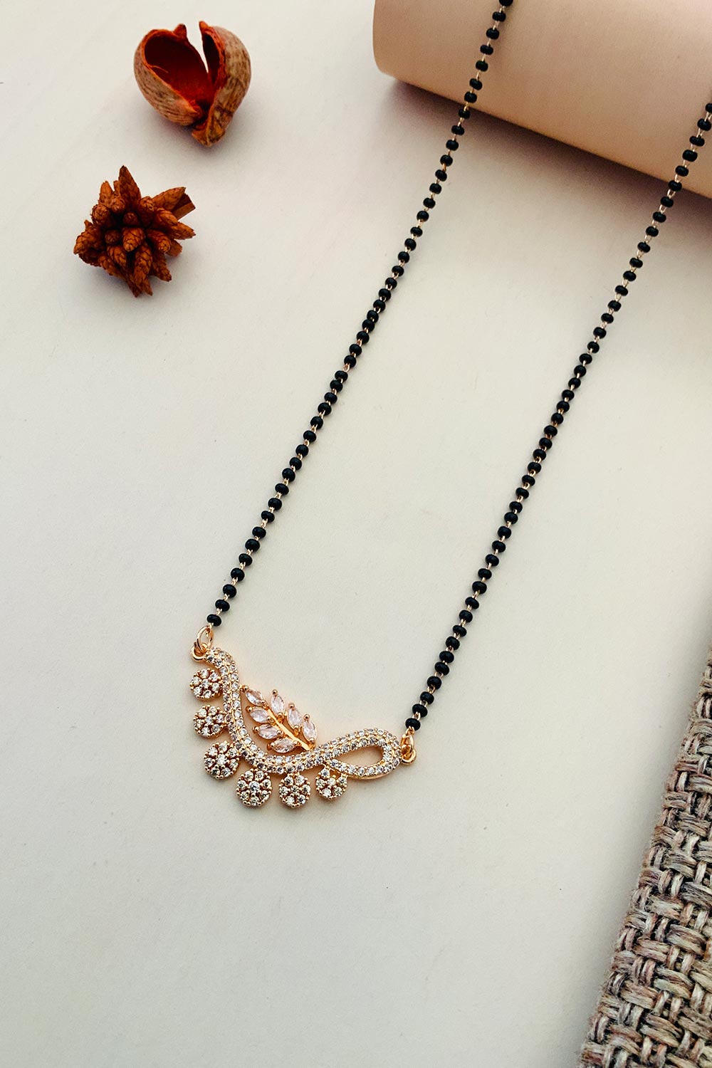 Rose Gold Plated American Diamond And Black Beaded Mangalsutra