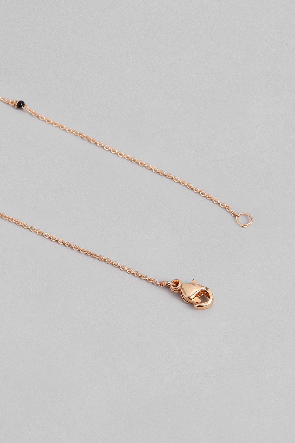 Rose Gold Plated American Diamond And Black Beaded Mangalsutra