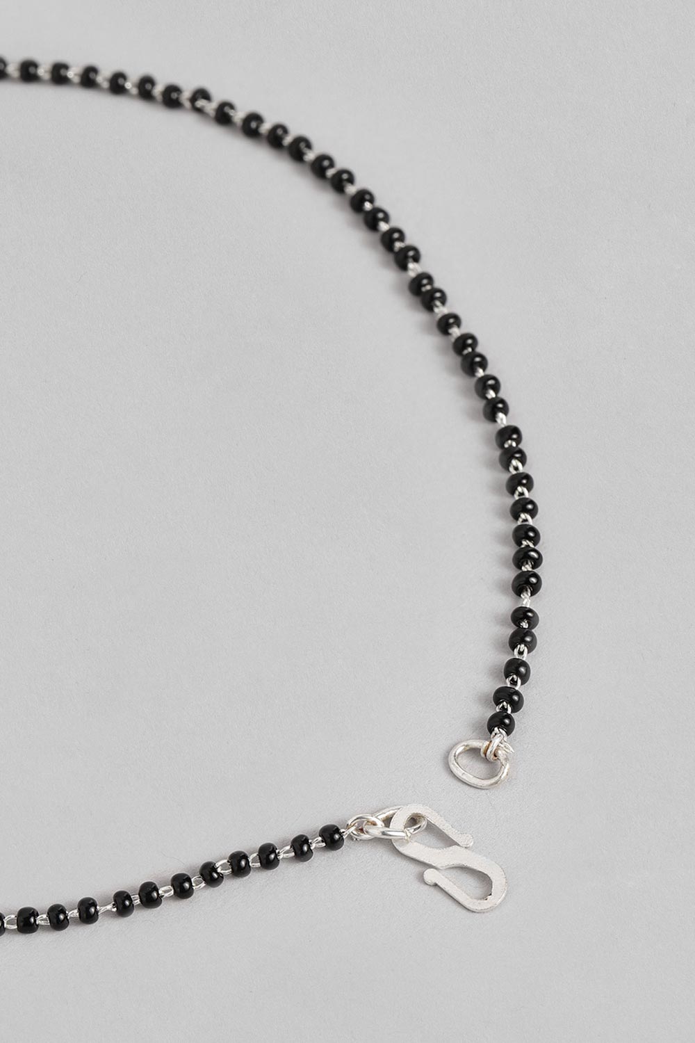 Silver Plated American Diamond And Black Beaded Mangalsutra