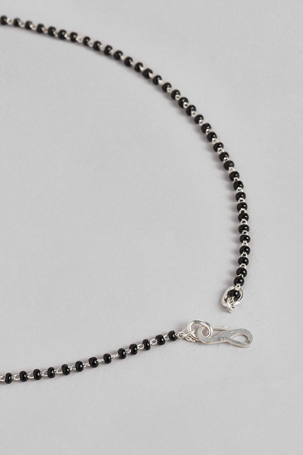 Silver Plated American Diamond And Black Beaded Mangalsutra