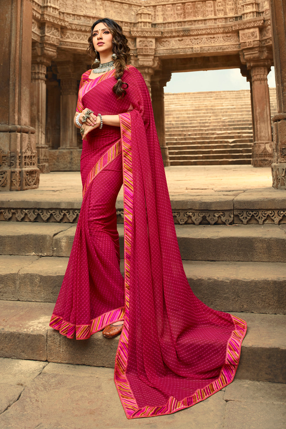 Faux Georgette Printed Saree In Rani Pink