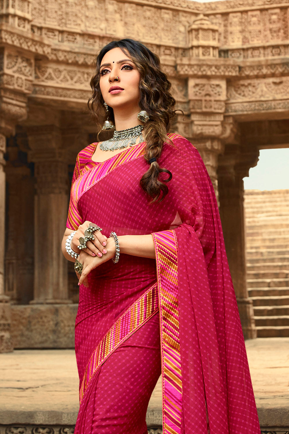 Faux Georgette Printed Saree In Rani Pink