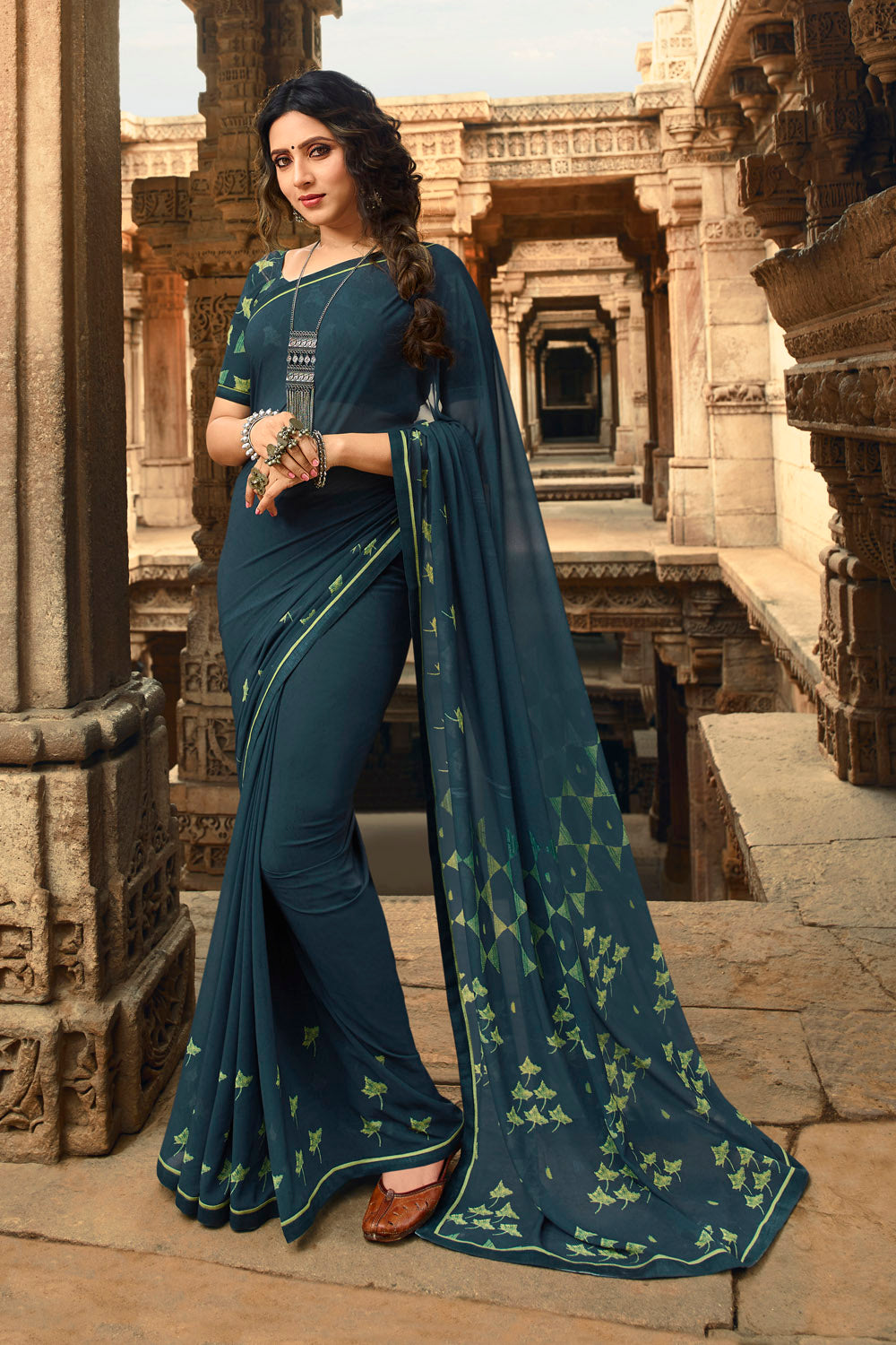 Faux Georgette Printed Saree In Teal Blue