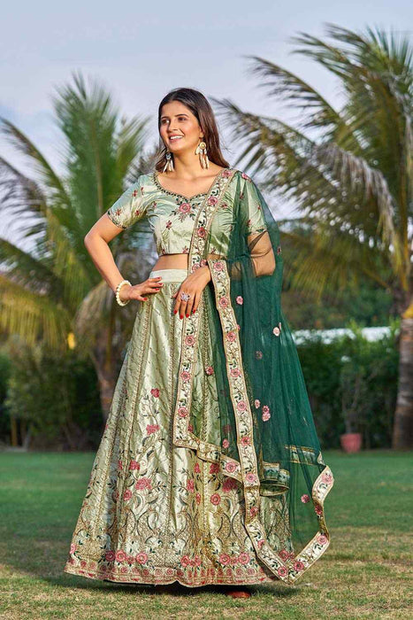 Net Zari Work Lehenga Choli in Light Green | Green lehenga, Designer lehenga  choli, Lehenga choli