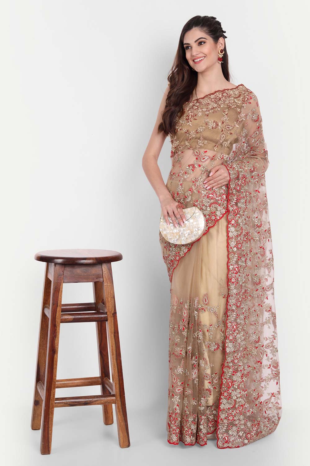 Gold Net Contrasted With Zari Embroidered Saree