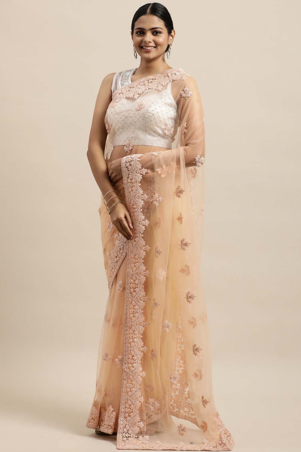 Net Embroidered Saree In Peach