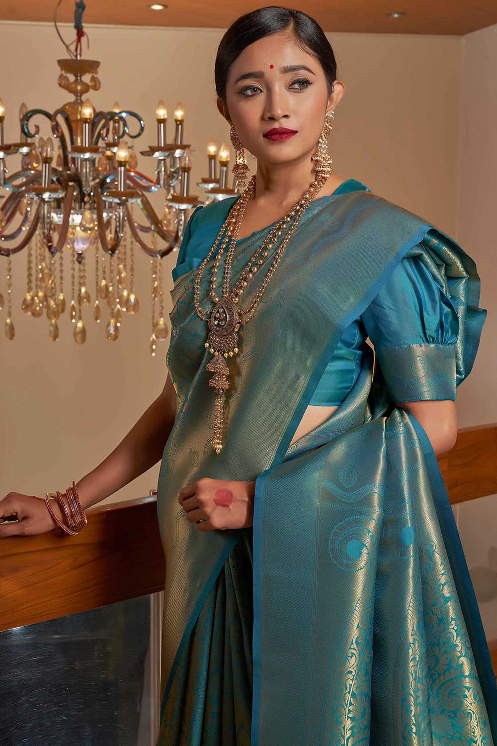 Teal Blue Kanchipuram Raw Silk Woven Saree