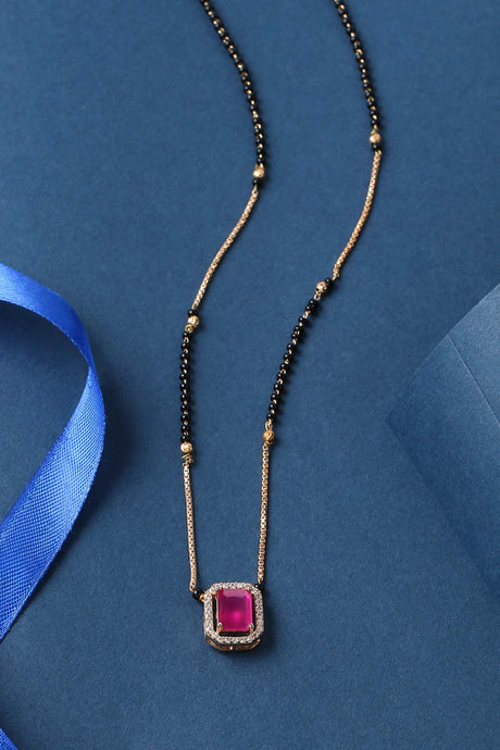Buy Gold plated And Black Beads Ad Studded Mangalsutra With Pink Stone Pendant Online