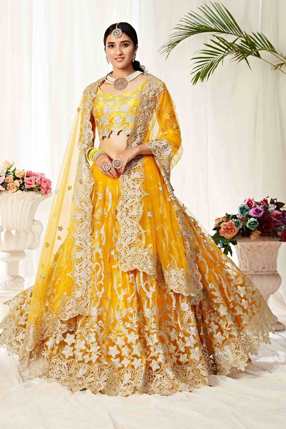 Net Embroidery Lehenga Choli in Yellow