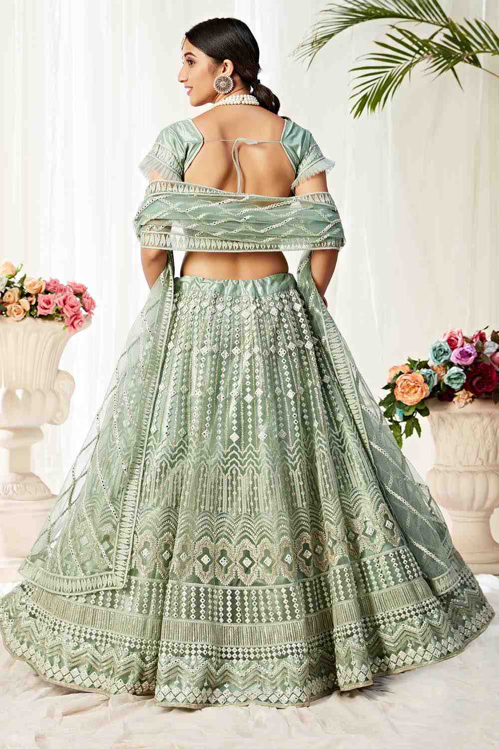 Net Embroidery Lehenga Choli in Pastel Green - Back