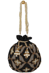 Dazzle Embellished Faux Silk Potli Black & Copper