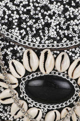 White And Black Metal Shell Embellished Clutch