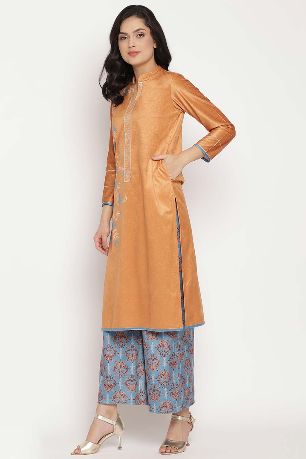 Buy Velvet Foil Print Kurta Set in Orange - Back