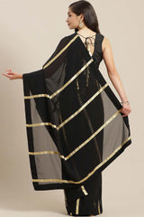 Buy Georgette Gold Striped Print Saree in Black - Front