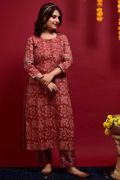 Buy Cotton Floral Print Kurta Set in Rust - Front