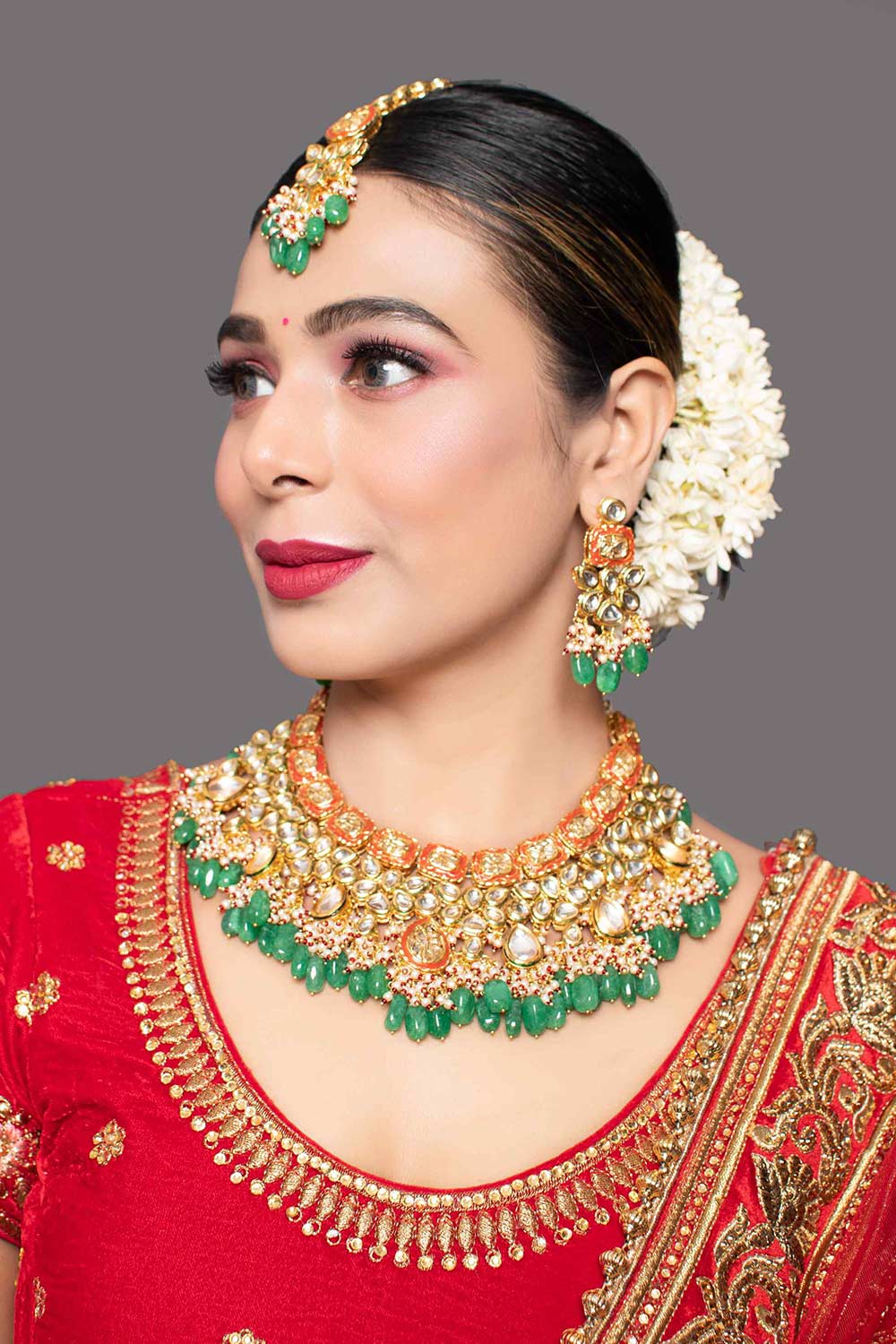 Green Red Gold Toned Handcrafted Kundan Necklace Sets With Maang Tikka