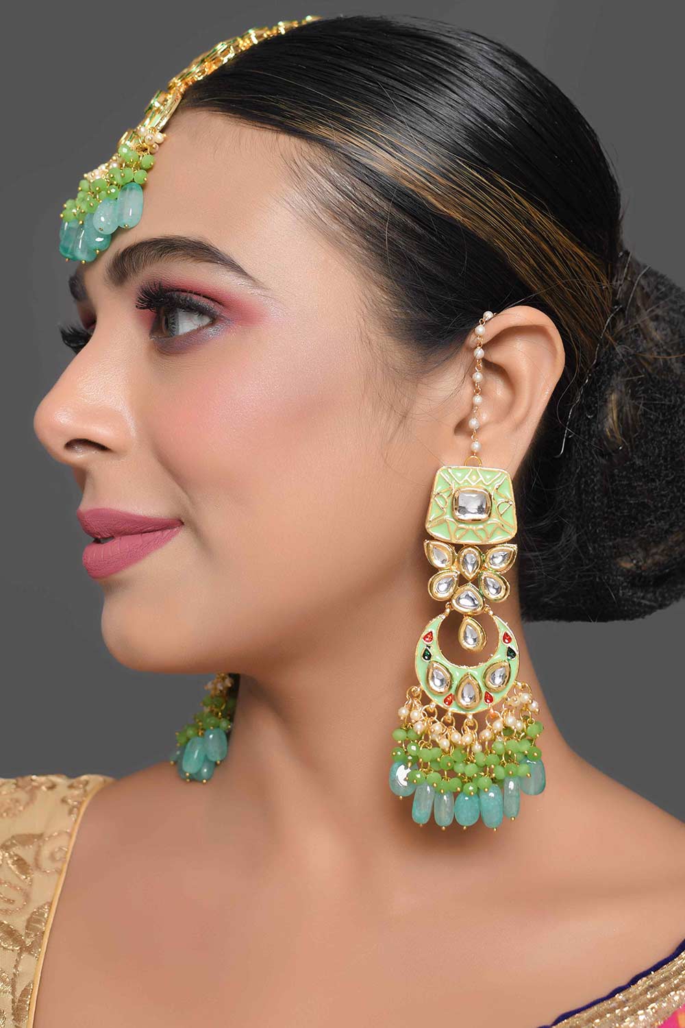 Green Enameled Kundan Earrings With Maangtikka