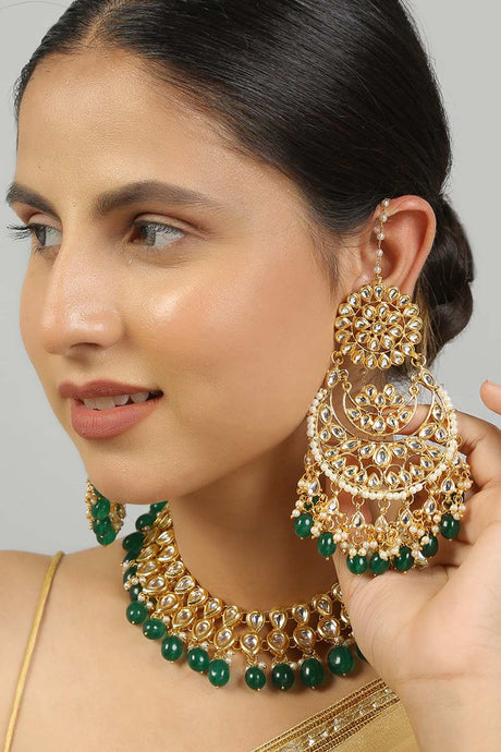 Gold Toned Kundan Necklace With Pair Of Earrings