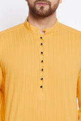 Buy Men's Cotton Solid Kurta in Yellow - Side