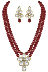 Maroon Gold Plated Kundan And Pearl Studded Necklace Jewelry Set