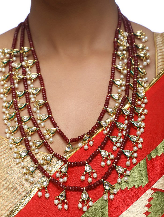 Women's Alloy Kundan Necklace with Studs Earrings in Gold and Red