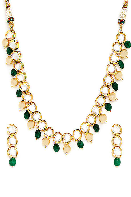 Alloy Kundan Neckpiece with Earrings in Gold and White