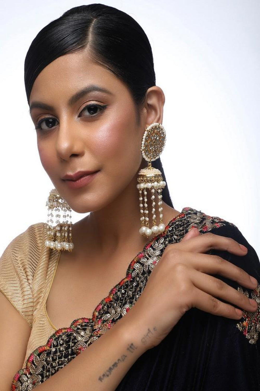 Women's Alloy Kundan Jhumka Earrings in Gold