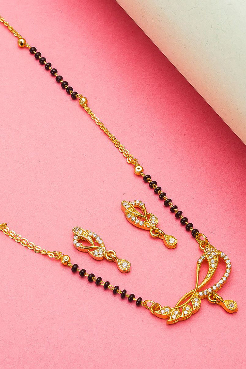  Buy Women's Alloy Mangalsutra Set in Gold and Black Online