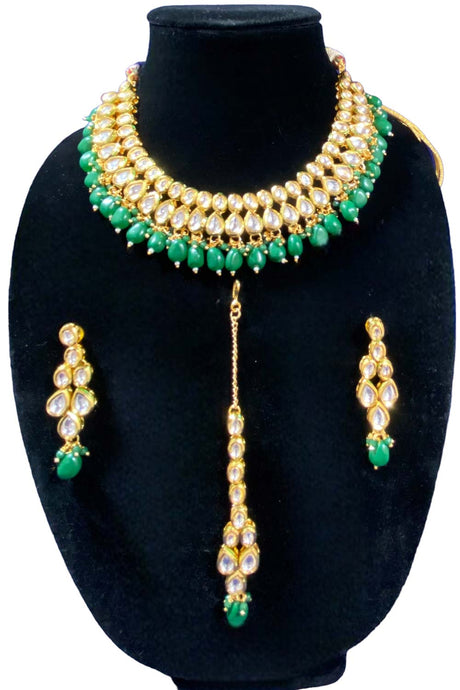 Emerald Green stone and Gold Kundan Necklace Set with Earrings and Maang Tikka