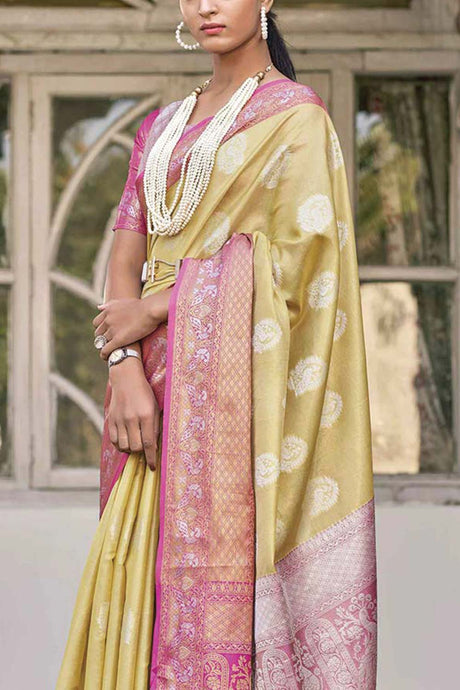 Buy Cream Tissue Silk Woven Design with Tassels Work Saree Online - KARMAPLACE